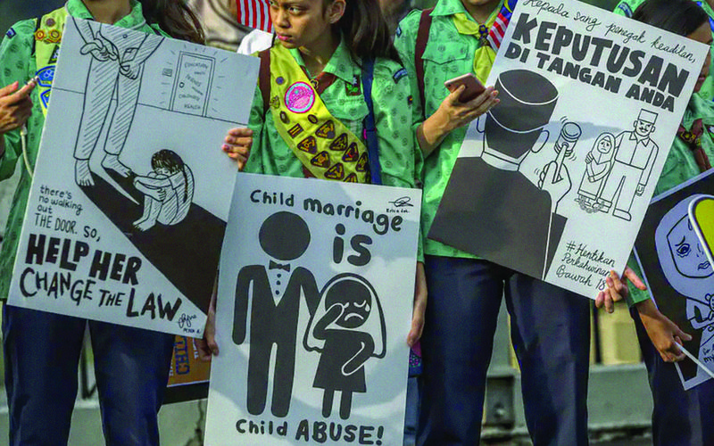 Perkawinan anak adalah masalah global. Foto: Ahmad Yusni/EPA